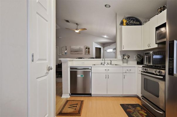 Interior, Kitchen, Recessed Lighting, Stainless Steel Appliances, Wood Texture Flooring