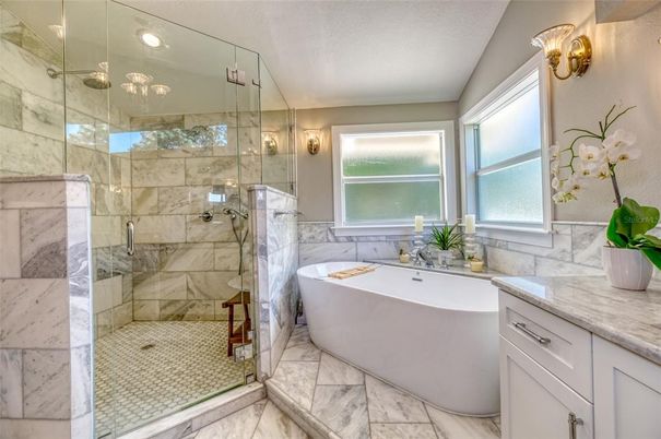 Bathroom, Free Standing Baths, Glass Shower, Interior, Marble, Marble Walls, Recessed Lighting