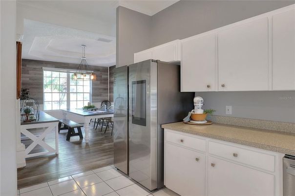 Dining room, Interior, Kitchen, Pendant Lights, Stainless Steel Appliances, Wood Texture Flooring