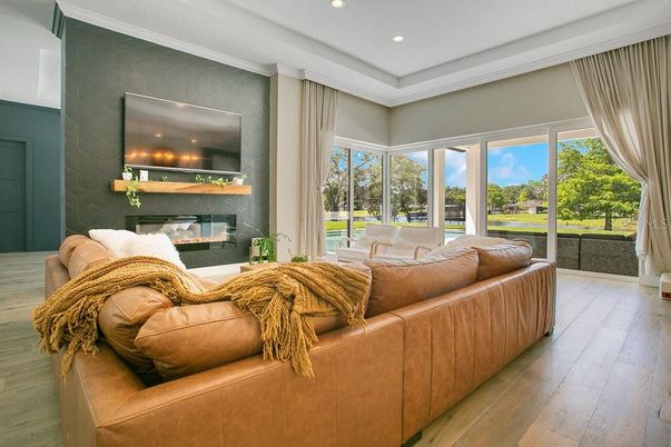 Fireplace, Interior, Living room, Recessed Lighting, Wood Texture Flooring