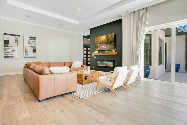 Fireplace, Interior, Living room, Recessed Lighting, Wood Texture Flooring