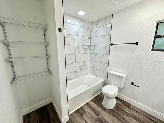 Bathroom, Interior, Marble Walls, Recessed Lighting, Wood Texture Flooring