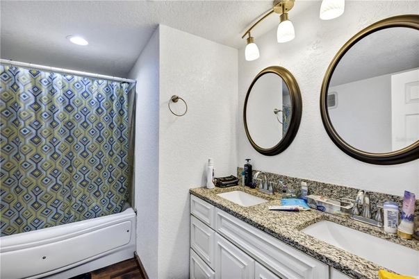 Bathroom, Dual Sink Vanities, Interior, Recessed Lighting, Wood Texture Flooring