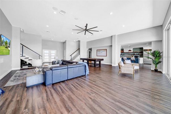Billiard Table, Game Room, Interior, Living room, Pendant Lights, Recessed Lighting, Wood Texture Flooring