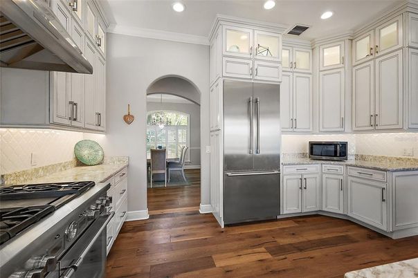 Chandelier, Dining room, Interior, Kitchen, Recessed Lighting, Stainless Steel Appliances, Wood Texture Flooring