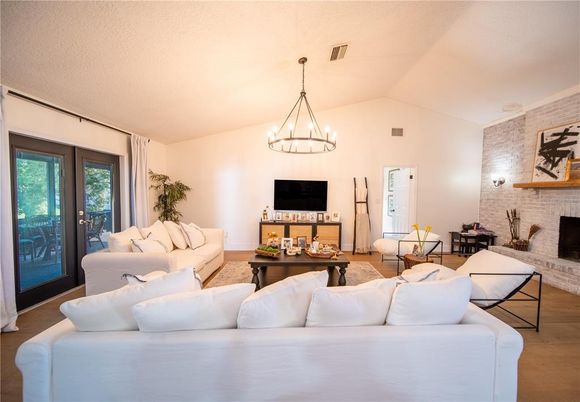 Fireplace, Interior, Living room, Pendant Lights, Stone Walls, Wood Texture Flooring