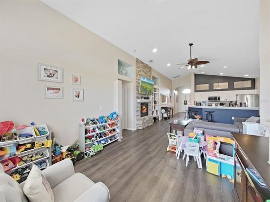 Fireplace, Interior, Kitchen, Living room, Recessed Lighting, Wood Texture Flooring
