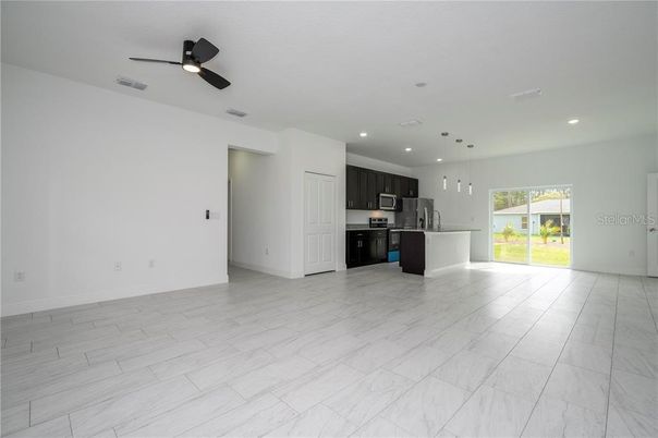 Empty room, Interior, Kitchen, Marble, Pendant Lights, Recessed Lighting, Stainless Steel Appliances