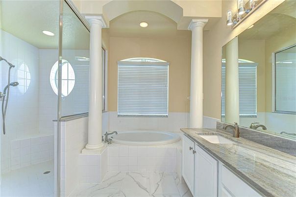 Bathroom, Dual Sink Vanities, Glass Shower, Interior, Marble, Recessed Lighting
