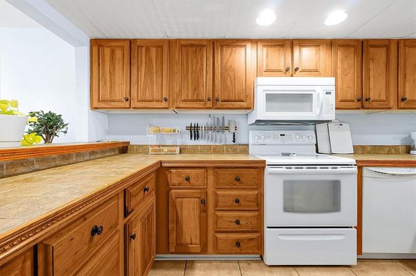 Interior, Kitchen, Recessed Lighting, Tile Countertops