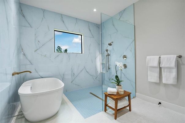 Bathroom, Free Standing Baths, Glass Shower, Interior, Marble Walls, Recessed Lighting