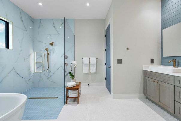 Bathroom, Free Standing Baths, Glass Shower, Interior, Marble Walls, Recessed Lighting