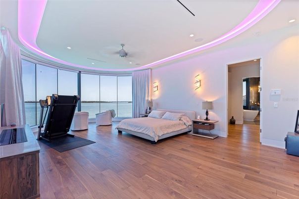 Bedroom, Fitness Equipment, Interior, Recessed Lighting, Water, Wood Texture Flooring