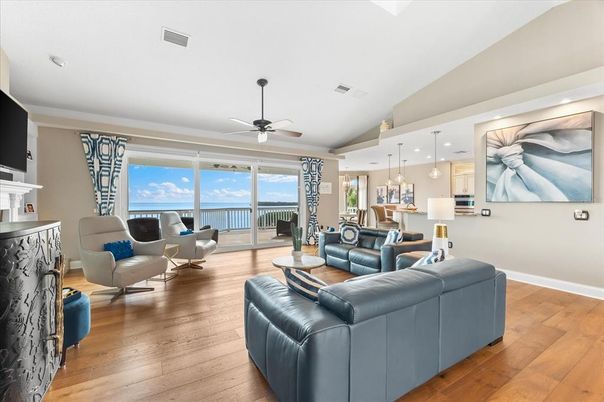 Fireplace, Interior, Living room, Pendant Lights, Recessed Lighting, Water, Wood Texture Flooring