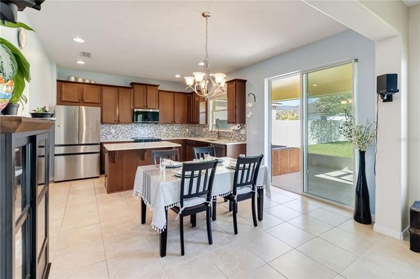 Chandelier, Dining room, Interior, Kitchen, Recessed Lighting, Stainless Steel Appliances