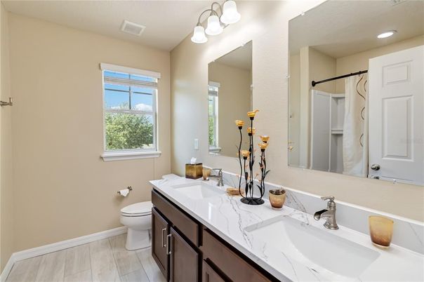 Bathroom, Dual Sink Vanities, Interior, Recessed Lighting, Wood Texture Flooring