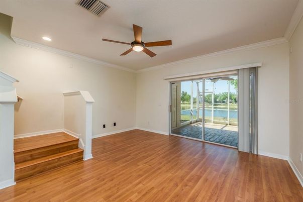 Empty room, Fireplace, Interior, Recessed Lighting, Water, Wood Texture Flooring