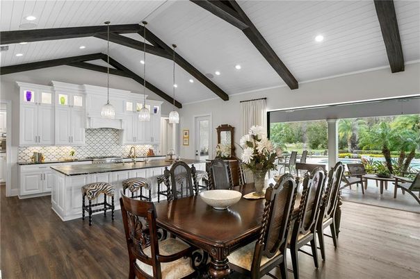 Dining room, Interior, Kitchen, Pendant Lights, Recessed Lighting, Stainless Steel Appliances, Wooden Beams, Wood Texture Flooring
