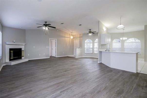 Empty room, Fireplace, Interior, Pendant Lights, Wood Texture Flooring