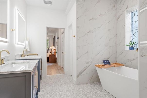 Bathroom, Dual Sink Vanities, Free Standing Baths, Interior, Marble Walls, Wood Texture Flooring