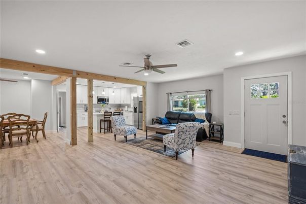 Dining room, Interior, Kitchen, Living room, Recessed Lighting, Stainless Steel Appliances, Wood Texture Flooring