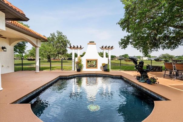 Exterior, Fireplace, Pool