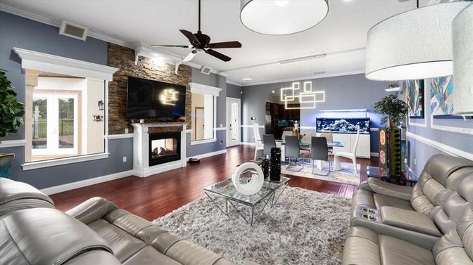 Dining room, Fireplace, Interior, Living room, Pendant Lights, Stone Walls, Wood Texture Flooring