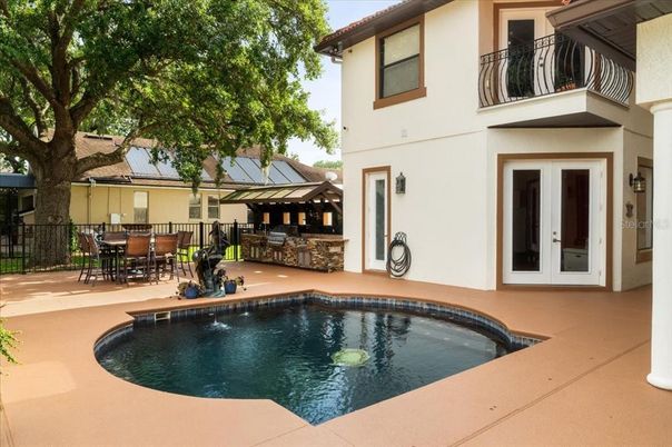 Exterior, Pool, Solar Panels