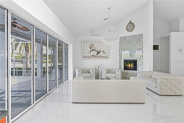 Chandelier, Fireplace, Interior, Living room