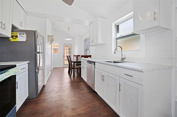 Dining room, Interior, Kitchen, Pendant Lights, Stainless Steel Appliances, Wood Texture Flooring