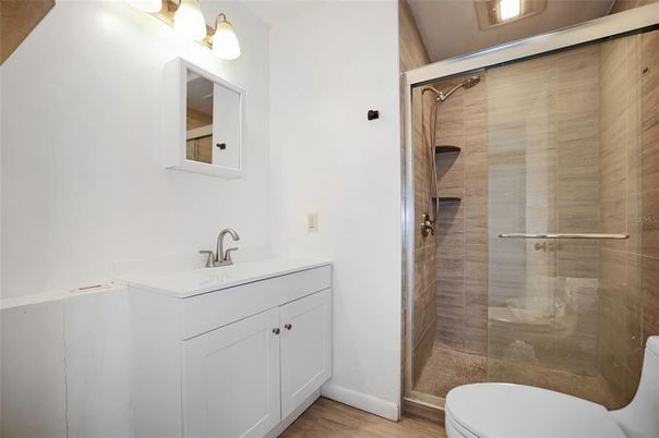 Bathroom, Glass Shower, Interior, Wood Texture Flooring