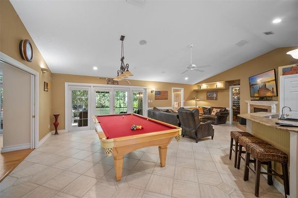 Billiard Table, Fireplace, Game Room, Interior, Living room, Pendant Lights, Recessed Lighting