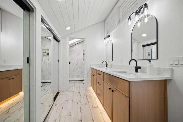 Bathroom, Dual Sink Vanities, Glass Shower, Interior, Marble, Marble Walls, Recessed Lighting