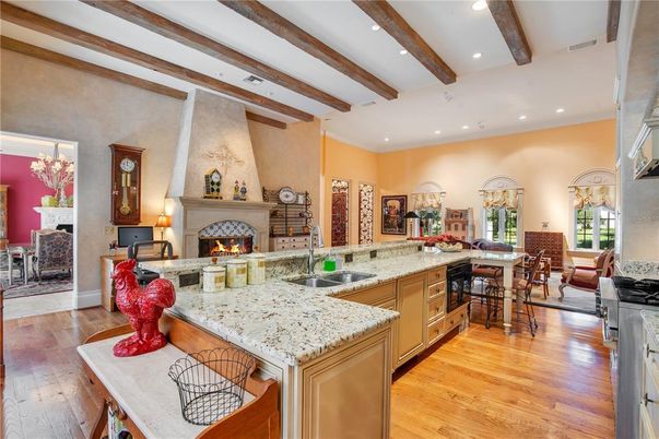 Chandelier, Dining room, Fireplace, Interior, Kitchen, Living room, Recessed Lighting, Wooden Beams, Wood Texture Flooring
