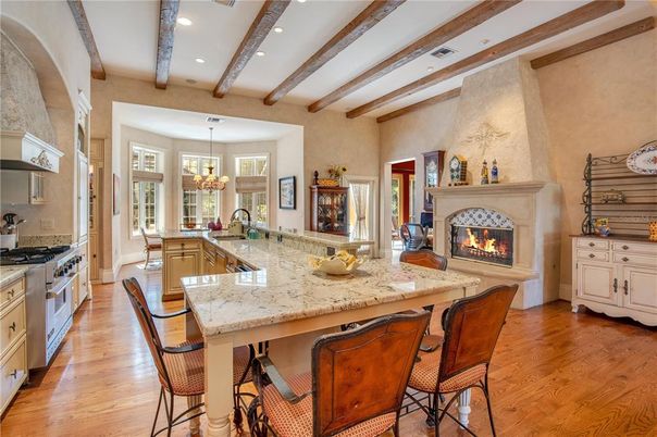 Chandelier, Fireplace, Interior, Kitchen, Recessed Lighting, Stainless Steel Appliances, Wooden Beams, Wood Texture Flooring