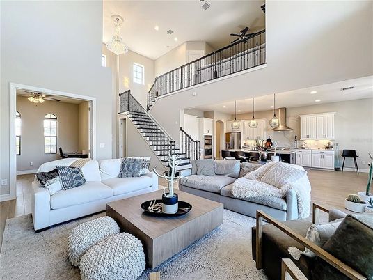 Chandelier, Interior, Kitchen, Living room, Pendant Lights, Recessed Lighting, Stainless Steel Appliances, Wood Texture Flooring