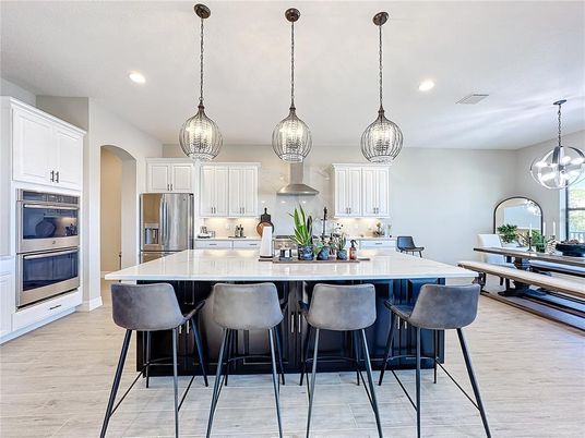 Dining room, Interior, Kitchen, Pendant Lights, Recessed Lighting, Stainless Steel Appliances, Wood Texture Flooring