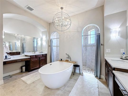 Bathroom, Chandelier, Dual Sink Vanities, Free Standing Baths, Glass Shower, Interior
