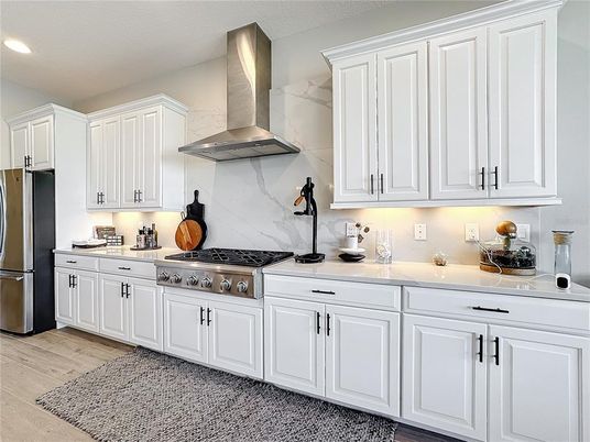 Interior, Kitchen, Marble Walls, Recessed Lighting, Stainless Steel Appliances, Wood Texture Flooring