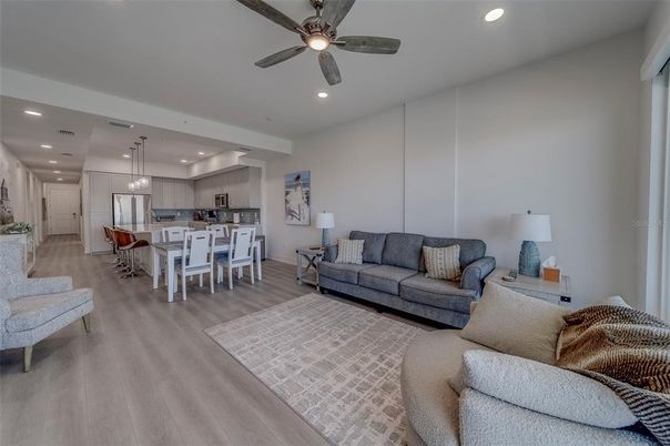Dining room, Interior, Kitchen, Living room, Pendant Lights, Recessed Lighting, Stainless Steel Appliances, Wood Texture Flooring