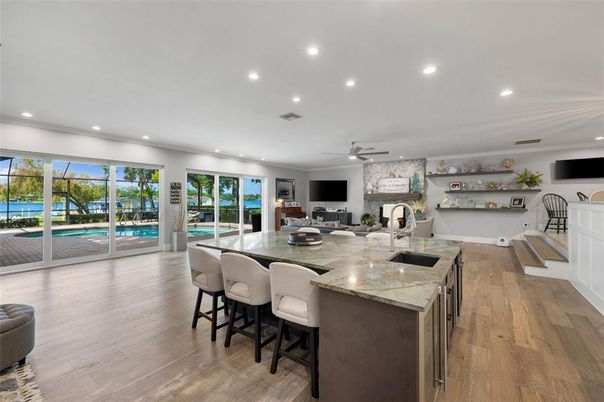 Fireplace, Interior, Kitchen, Recessed Lighting, Wood Texture Flooring
