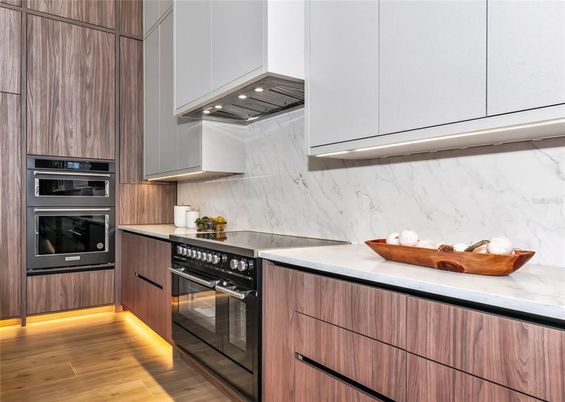 Interior, Kitchen, Marble Walls, Stainless Steel Appliances, Wood Texture Flooring