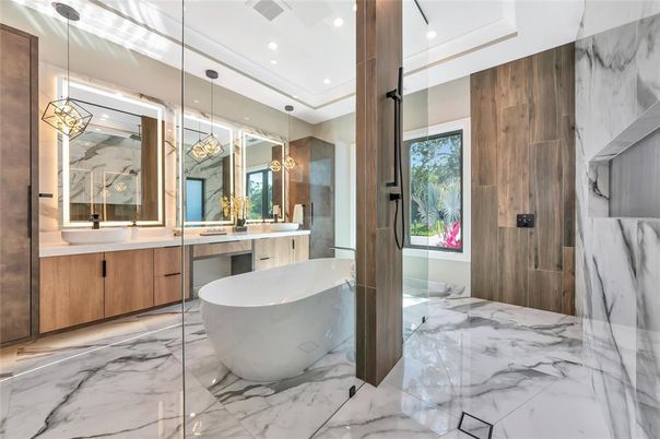 Bathroom, Dual Sink Vanities, Free Standing Baths, Glass Shower, Interior, Marble, Marble Walls, Pendant Lights, Recessed Lighting