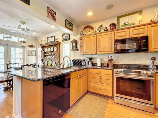 Dining room, Interior, Kitchen, Recessed Lighting, Stainless Steel Appliances, Wood Texture Flooring