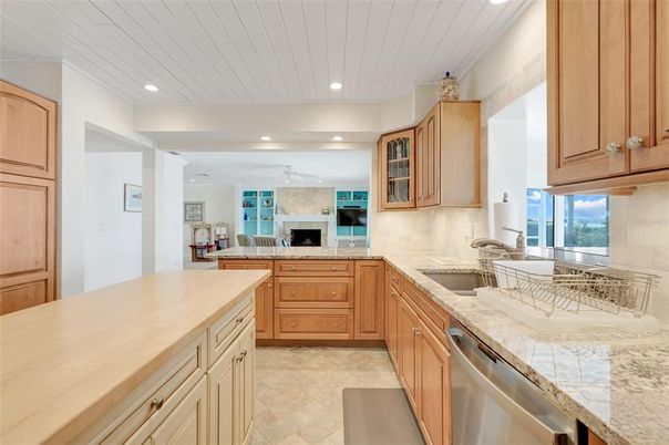 Fireplace, Interior, Kitchen, Recessed Lighting, Stainless Steel Appliances