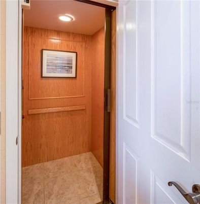 Elevator, Interior, Recessed Lighting, Wooden Walls