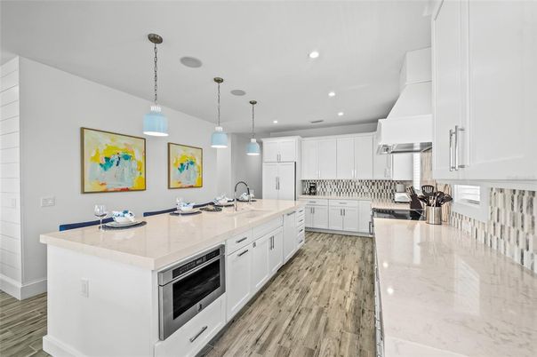 Interior, Kitchen, Pendant Lights, Recessed Lighting, Stainless Steel Appliances, Wood Texture Flooring