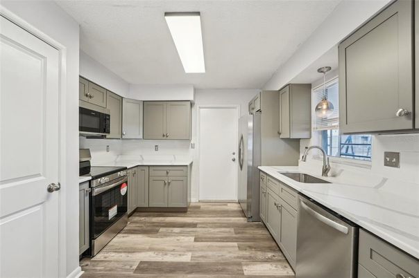 Interior, Kitchen, Pendant Lights, Stainless Steel Appliances, Wood Texture Flooring