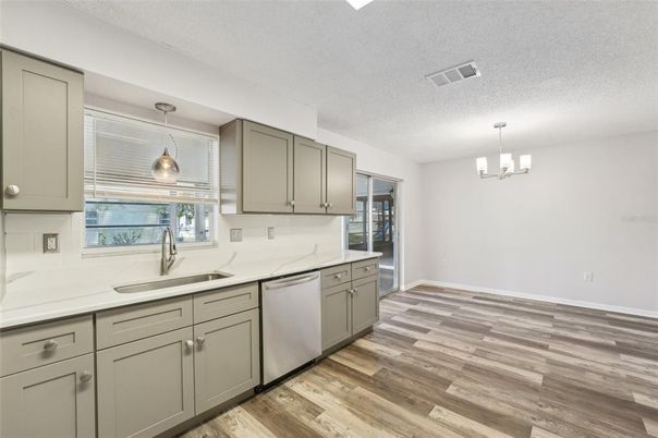 Chandelier, Interior, Kitchen, Pendant Lights, Stainless Steel Appliances, Wood Texture Flooring