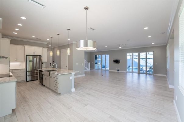 Interior, Kitchen, Pendant Lights, Recessed Lighting, Stainless Steel Appliances, Wood Texture Flooring